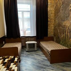 Кровать в трехместном общем номере