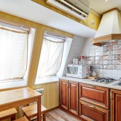 Номер стандарт с 2 односпальными кроватями, дополнительным местом и кухней