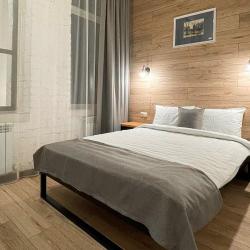 Номер улучшенный стандарт с 2 односпальными и 1 двуспальной кроватью