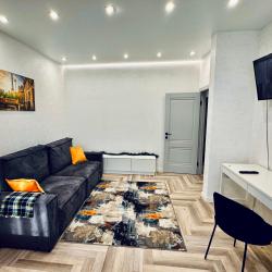 Фото Апартаменты на улице Октябрьская 181/2 корпус 3