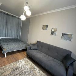 Фото Апартаменты на улице Октябрьская 221/3