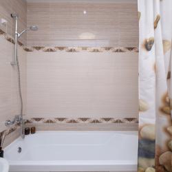 Фото Апартаменты Комфорт на улице Разведчика Ахмерова 3