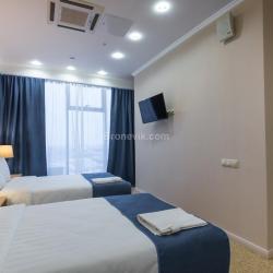 Номер люкс с 2 односпальными кроватями