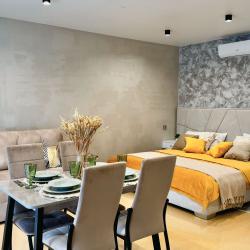 4-местный номер делюкс с 1 двуспальной кроватью