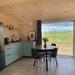 Фото Отель Коттеджи МатрёшкаHOME (Хоум)