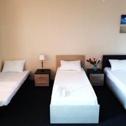 Комната комфорт с 4 односпальными кроватями