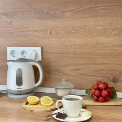 Фото Отель Уютная квартира в ЖК Рекорд