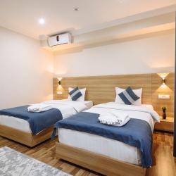 Номер люкс с 2 односпальными кроватями