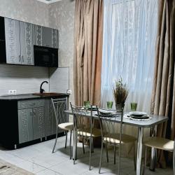 4-местный 2-комнатный номер люкс с 1 двуспальной кроватью