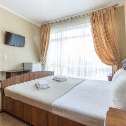 Комната стандарт с 1 двуспальной кроватью и балконом