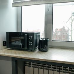 Фото Отель TroeSutokApart Металлургов 27