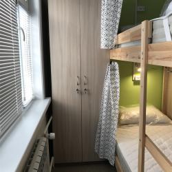 Кровать в 6-местном общем женском номере (удобства на этаже)