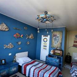 Кровать в 3-местном общем мужском номере Кусто