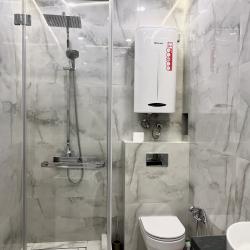 Фото Апартаменты улучшенные на улице Алексея Козина 2
