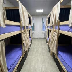 Кровать в 8-местном общем номере