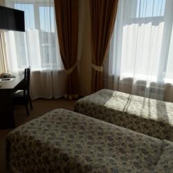 Кровать в номере cемейный