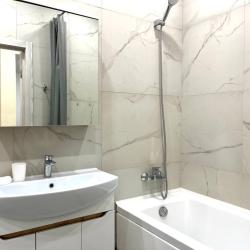 Фото Отель Romlex Apartments (Ромлекс) на улице Героев Сталинградской битвы 9