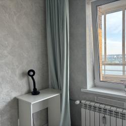 Фото Отель Уютная квартира в центре города с видом на Ангару