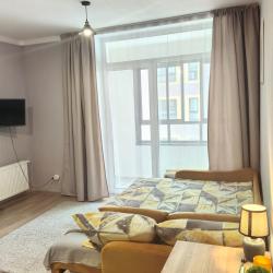 Фото Уютные Апартаменты на Новосинарском бульваре 7