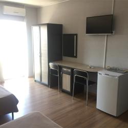 Комната комфорт с 2 односпальными и 1 двуспальной кроватью