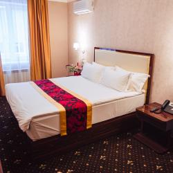 Номер улучшенный стандарт с 1 односпальной кроватью