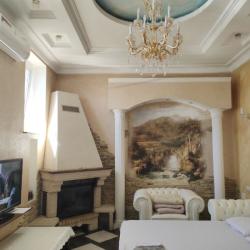 Комната делюкс с 1 односпальной и 1 двуспальной кроватью