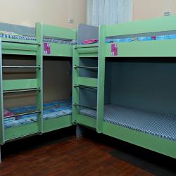 Кровать в 10-местном общем номере