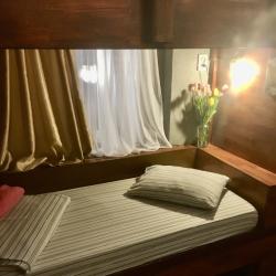 Номер стандарт семейный с диваном-кроватью и вторым ярусом (общие удобства)