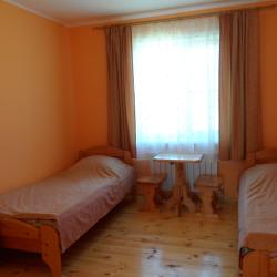Номер стандарт с 2 односпальными кроватями (удобства на этаже)