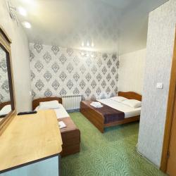 Номер стандарт улучшенный с 1 односпальной и 1 двуспальной кроватью