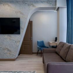 Номер делюкс с 1 двуспальной кроватью и диваном