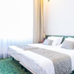 Двухместный стандартный номер с одной большой или двумя кроватями