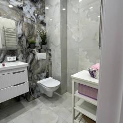 Фото Просторные Апартаменты в центре 55м²