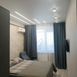 Фото Уютные апартаменты на улице Академика Королёва 20Г