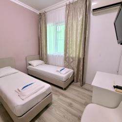 Комната эконом с 2 односпальными кроватями (общие удобства)