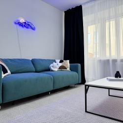 Фото Стильные апартаменты с видом на колесо Обозрения