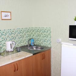 Номер улучшенный стандарт с 4 односпальными и 1 двуспальной кроватью