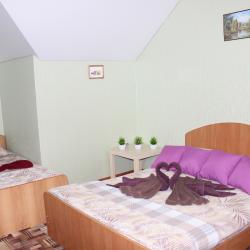 Номер улучшенный стандарт с 4 односпальными и 1 двуспальной кроватью