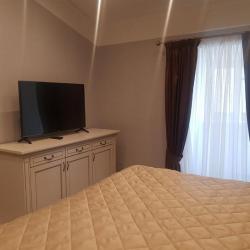 Двухуровневый номер люкс с двуспальной кроватью