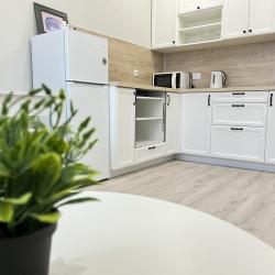 Фото Отель Romlex Apartments (Ромлекс) на улице Героев Сталинградской битвы 1