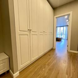 Фото Отель Новая квартира с кроватью возле панорамного окна, высокий этаж