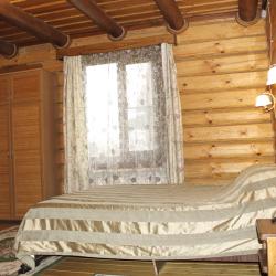 Двухместный номер в деревянном коттедже с сауной и камином