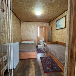 Фото Отель Гостевые домики Огонек