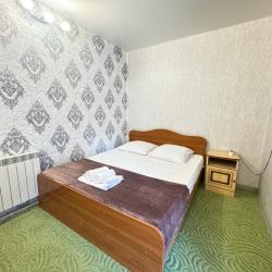 Номер стандарт улучшенный с 1 односпальной и 1 двуспальной кроватью