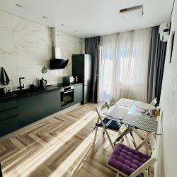 Фото Апартаменты на улице Октябрьская 181/2 корпус 3