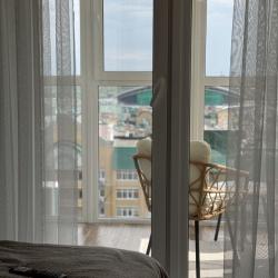 Фото Апартаменты на улице Адоратского 1Б