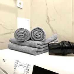 Фото Отель Romlex Apartments (Ромлекс) на улице Героев Сталинградской битвы 9