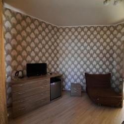 Комната делюкс с 1 односпальной и 1 двуспальной кроватью
