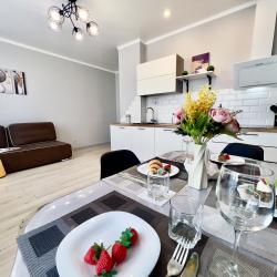 1-комнатные апартаменты люкс на 17 этаже с видом на реку Тура