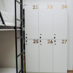 Кровать в 15-местном общем женском номере с 5 трехъярусными кроватями (общие удобства)